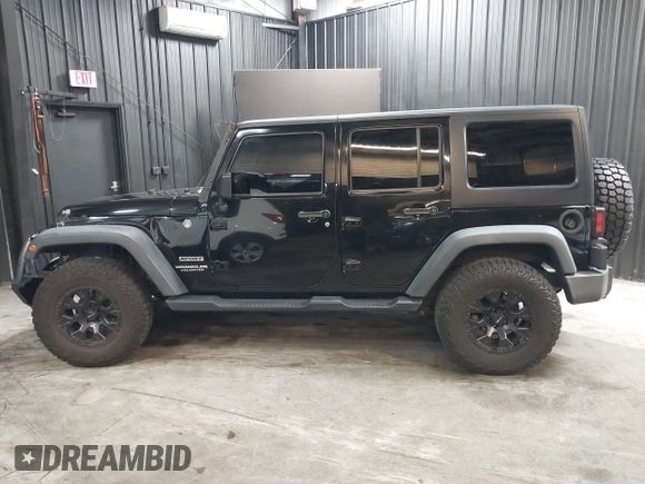 2015 Jeep Wrangler Unlimited Willys Wheeler with VIN 1C4BJWDG1FL749803, listed as a IAAI auction lot 41995132 with 156,595 mi miles and . Bid and sale history available at DreamBid. Image 15.