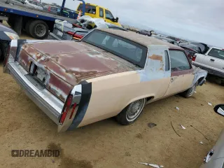 1981 Cadillac Fleetwood z VIN 1G6AB4790B9242220, wystawiony jako Copart lot #88823935 z przebiegiem 57 484 mil mil oraz Szkoda całkowita • Salvage title. Historia ofert i sprzedaży dostępna na DreamBid. Obrazek 3.
