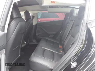 2022 Tesla Model 3 with VIN 5YJ3E1EA7NF314744, listed as a IAAI auction lot 42057596 with 30,936 mi miles and . Bid and sale history available at DreamBid. Image 8.
