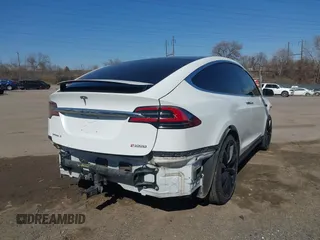2018 Tesla Model X 75D with VIN 5YJXCAE45JF103828, listed as a IAAI auction lot 41698708 with 118,699 mi miles and . Bid and sale history available at carsss.com. Image 18.