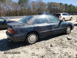 1997 Honda Accord EX with VIN 1HGCD5652VA034672, listed as a Copart auction lot 49098795 with 203,283 mi miles and Salvage Title. Bid and sale history available at DreamBid. Image 3.