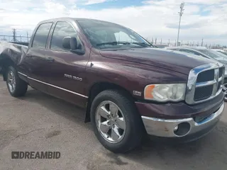 2005 Dodge 1500 SLT with VIN 1D7HA18D05S215506, listed as a IAAI auction lot 41957222 with 143,992 mi miles. Bid and sale history available at carsss.com. Image 1.