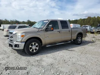 2012 Ford F-250 XL with VIN 1FT7W2AT2CEC28798, listed as a Copart auction lot 74479004 with 65,509 mi miles and Salvage title. Bid and sale history available at DreamBid. Image 1.