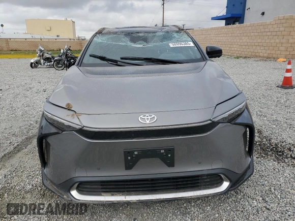 2024 Toyota bZ4X XLE with VIN JTMAAAAA8RA045760, listed as a Copart auction lot 50996385 with 3,833 mi miles and Salvage Title. Bid and sale history available at DreamBid. Image 5.