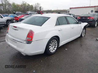 2014 Chrysler 300 with VIN 2C3CCAAG5EH128036, listed as a IAAI auction lot 41988327 with 153,809 mi miles. Bid and sale history available at carsss.com. Image 4.