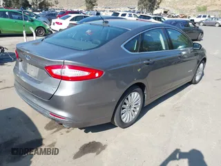 2013 Ford Fusion SE Hybrid with VIN 3FA6P0LU8DR178254, listed as a IAAI auction lot 42223543 with 139,995 mi miles and . Bid and sale history available at DreamBid. Image 4.