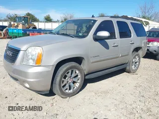 2007 GMC Yukon SLT with VIN 1GKFK130X7J116272, listed as a IAAI auction lot 41637965 with 203,581 mi miles. Bid and sale history available at carsss.com. Image 2.