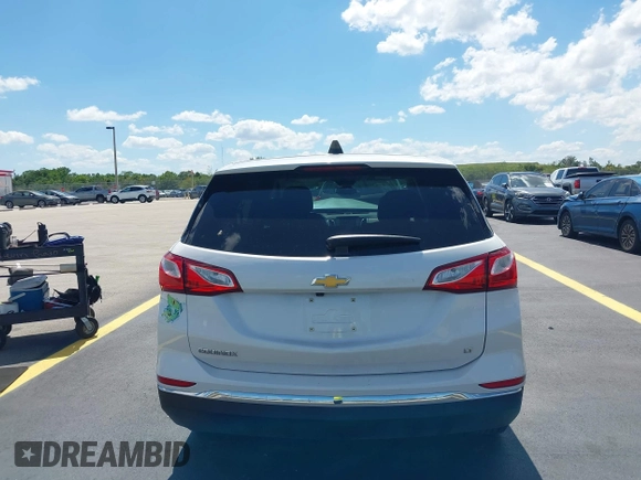 2020 Chevrolet Equinox LT z VIN 3GNAXKEV0LS650936, wystawiony jako IAAI lot #42263480 z przebiegiem 51 723 mil mil oraz . Historia ofert i sprzedaży dostępna na DreamBid. Obrazek 16.