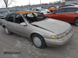 1994 Ford Taurus GL z VIN 1FALP52U6RA258445, wystawiony jako IAAI lot #41512672 z przebiegiem Nie podano mil oraz . Historia ofert i sprzedaży dostępna na DreamBid. Obrazek 1.