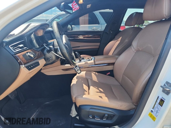 2015 BMW 7 Series 750Li with VIN WBAYE8C59FD782291, listed as a Copart auction lot 65119745 with 159,479 mi miles and Salvage title. Bid and sale history available at DreamBid. Image 7.
