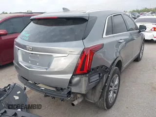 2021 Cadillac XT5 FWD Premium Luxury with VIN 1GYKNCRS5MZ128908, listed as a IAAI auction lot 41919571 with 51,280 mi miles and . Bid and sale history available at carsss.com. Image 4.