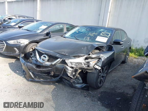 2016 Nissan Maxima SL with VIN 1N4AA6AP5GC448751, listed as a IAAI auction lot 41935029 with 105,101 mi miles and . Bid and sale history available at DreamBid. Image 2.