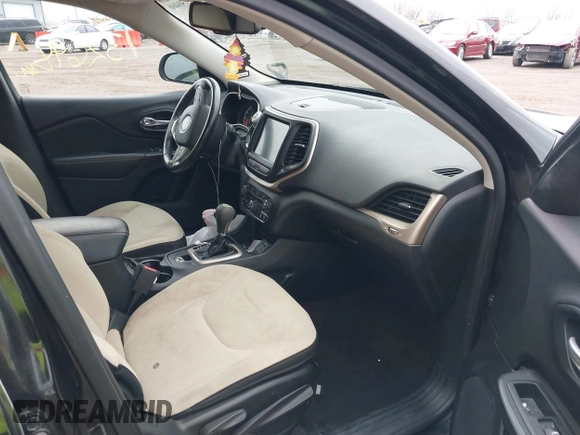 2016 Jeep Cherokee Latitude with VIN 1C4PJLCB1GW256777, listed as a IAAI auction lot 41150466 with 133,000 mi miles. Bid and sale history available at carsss.com. Image 5.