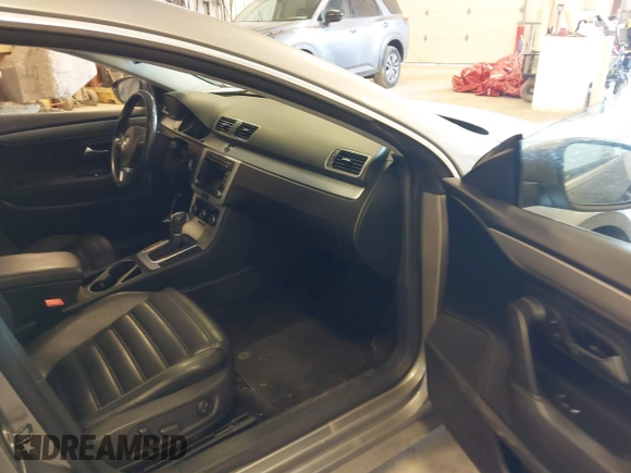 2012 Volkswagen CC Sport with VIN WVWMN7AN9CE508965, listed as a IAAI auction lot 42143188 with 129,205 mi miles. Bid and sale history available at carsss.com. Image 5.