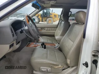 2003 Infiniti QX4 with VIN JNRDR09X83W251941, listed as a Copart auction lot 71044774 with 162,214 mi miles and Salvage Title. Bid and sale history available at DreamBid. Image 7.