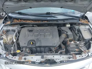 2013 Toyota Corolla L with VIN 2T1BU4EEXDC052854, listed as a IAAI auction lot 42230118 with 156,120 mi miles and . Bid and sale history available at DreamBid. Image 10.