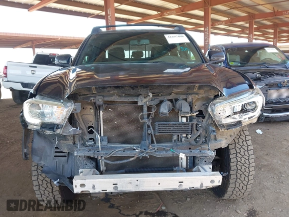 2017 Toyota Tacoma SR5 z VIN 3TMCZ5AN0HM110825, wystawiony jako IAAI lot #42297408 z przebiegiem 126 769 mil mil oraz . Historia ofert i sprzedaży dostępna na DreamBid. Obrazek 6.