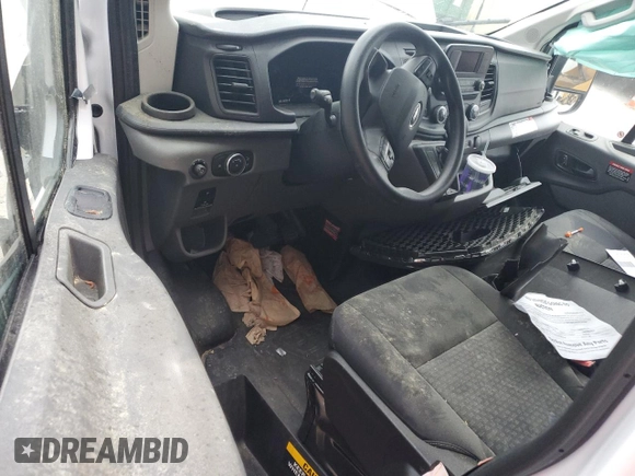 2024 Ford Transit Cargo с VIN 1FTBR1Y89RKA87462, выставлен на аукционе Copart как лот 59623925 с пробегом 9 382 миль миль и Списание • Salvage title. История ставок и продаж доступна на DreamBid. Изображение 8.