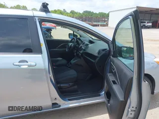 2012 Mazda 5 Sport with VIN JM1CW2BLXC0106748, listed as a IAAI auction lot 42435965 with 153,786 mi miles and . Bid and sale history available at DreamBid. Image 5.