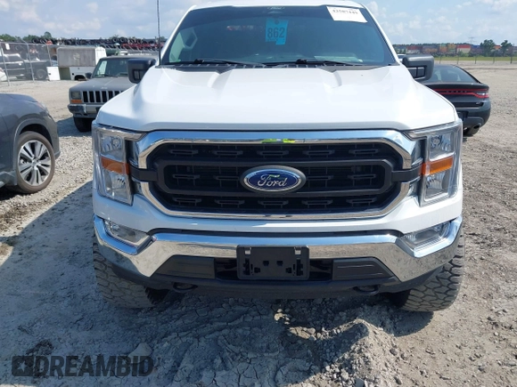 2022 Ford F-150 XL with VIN 1FTFW1E57NFB47648, listed as a IAAI auction lot 42587449 with 38,149 mi miles and . Bid and sale history available at DreamBid. Image 12.