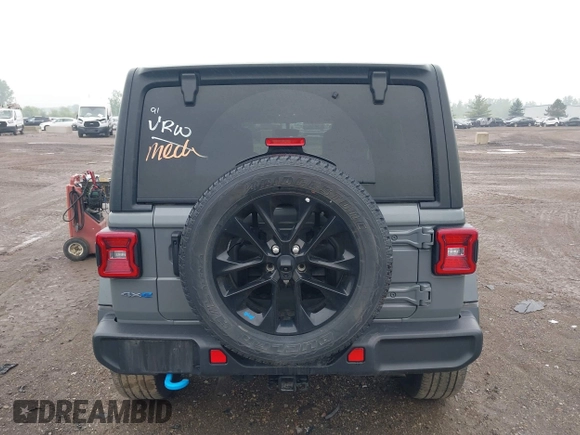 2023 Jeep Wrangler Sahara with VIN 1C4JJXP6XPW698886, listed as a IAAI auction lot 42439690 with 41,787 mi miles and . Bid and sale history available at DreamBid. Image 16.