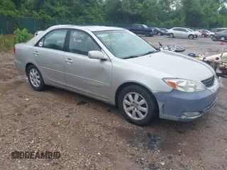2004 Toyota Camry LE with VIN 4T1BF30KX4U580913, listed as a IAAI auction lot 42265305 with 246,197 mi miles and . Bid and sale history available at DreamBid. Image 1.