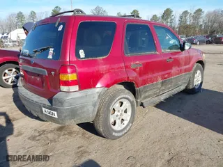 2005 Ford Escape XLT with VIN 1FMCU93115KB85547, listed as a IAAI auction lot 41669441 with 267,022 mi miles. Bid and sale history available at carsss.com. Image 4.