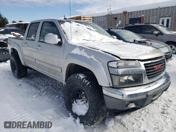 2011 GMC Canyon SLT with VIN 1GTH6NFE2B8117617, listed as a Copart auction lot 43222695 with 146,277 mi miles and Salvage Title. Bid and sale history available at carsss.com. Image 4.