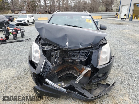 2014 Cadillac SRX Premium Collection z VIN 3GYFNGE3XES577569, wystawiony jako Copart lot #48399735 z przebiegiem Nie podano mil oraz Szkoda całkowita • Salvage title. Historia ofert i sprzedaży dostępna na DreamBid. Obrazek 5.