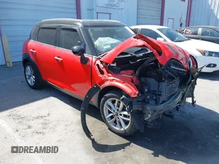 2011 MINI Countryman z VIN WMWZB3C54BWM00859, wystawiony jako IAAI lot #42344136 z przebiegiem 103 282 mil mil oraz . Historia ofert i sprzedaży dostępna na DreamBid. Obrazek 1.