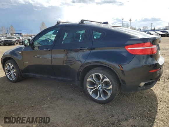 2012 BMW X6 50i z VIN 5UXFG8C59CLZ97450, wystawiony jako Copart lot #55281205 z przebiegiem 188 625 mil mil oraz Czysty tytuł • Clean title. Historia ofert i sprzedaży dostępna na DreamBid. Obrazek 2.