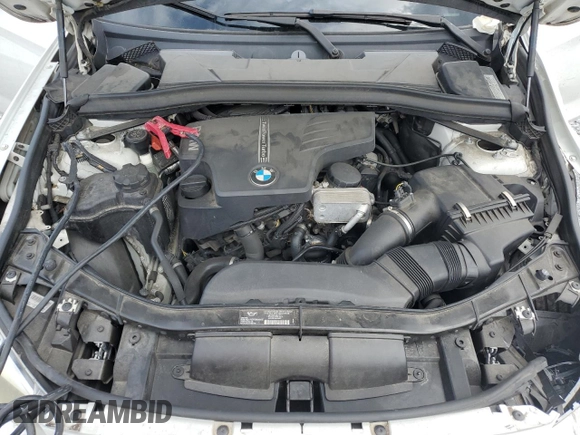 2014 BMW X1 sDrive28i z VIN WBAVM1C56EVW46769, wystawiony jako Copart lot #55341965 z przebiegiem 82 805 mil mil oraz Szkoda całkowita • Salvage title. Historia ofert i sprzedaży dostępna na DreamBid. Obrazek 12.