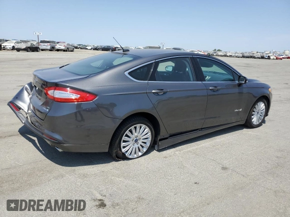 2016 Ford Fusion SE Hybrid with VIN 3FA6P0LU9GR166408, listed as a Copart auction lot 59931995 with 104,560 mi miles and Salvage title. Bid and sale history available at DreamBid. Image 3.