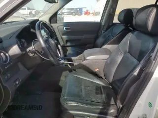 2011 Honda Pilot Touring z VIN 5FNYF3H98BB005411, wystawiony jako Copart lot #52392765 z przebiegiem 155 541 mil mil oraz Szkoda całkowita • Salvage title. Historia ofert i sprzedaży dostępna na DreamBid. Obrazek 7.