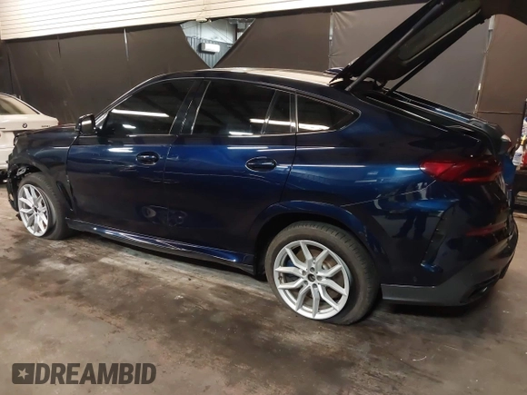 2022 BMW X6 M50i z VIN 5UXCY8C05N9J70601, wystawiony jako IAAI lot #42344397 z przebiegiem 49 085 mil mil oraz . Historia ofert i sprzedaży dostępna na DreamBid. Obrazek 3.