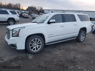 2020 GMC Yukon XL Denali with VIN 1GKS2HKJ1LR299560, listed as a Copart auction lot 84943284 with 99,084 mi miles and Salvage Title. Bid and sale history available at carsss.com. Image 1.