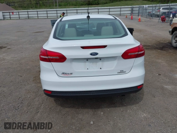 2016 Ford Focus SE with VIN 1FADP3F21GL403121, listed as a IAAI auction lot 42130743 with 103,592 mi miles and . Bid and sale history available at DreamBid. Image 16.