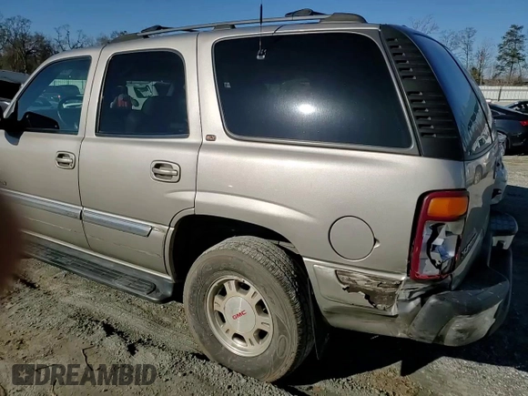 2001 GMC Yukon SLT z VIN 1GKEC13T71J223368, wystawiony jako Copart lot #86610954 z przebiegiem 414 811 mil mil oraz Szkoda całkowita • Salvage title. Historia ofert i sprzedaży dostępna na DreamBid. Obrazek 12.