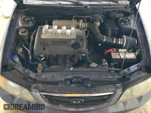 2003 Kia Spectra GS z VIN KNAFB161135104592, wystawiony jako Copart lot #52097205 z przebiegiem 119 206 mil mil oraz Szkoda całkowita • Salvage title. Historia ofert i sprzedaży dostępna na DreamBid. Obrazek 11.