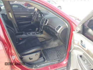 2011 Jeep Grand Cherokee Laredo with VIN 1J4RR4GG6BC527897, listed as a IAAI auction lot 42032975 with 148,875 mi miles. Bid and sale history available at carsss.com. Image 5.