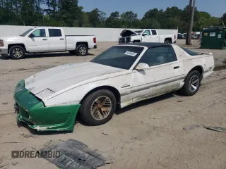 1991 Pontiac Firebird z VIN 1G2FS23E5ML239639, wystawiony jako Copart lot #54986095 z przebiegiem 154 017 mil mil oraz Tytuł czysty. Historia ofert i sprzedaży dostępna na DreamBid. Obrazek 1.