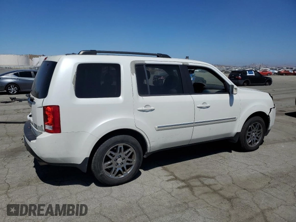 2013 Honda Pilot Touring with VIN 5FNYF4H95DB016049, listed as a Copart auction lot 61012725 with 104,252 mi miles and Salvage title. Bid and sale history available at DreamBid. Image 3.