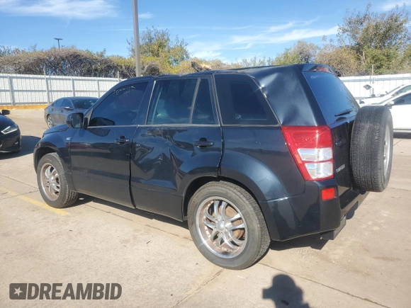 2007 Suzuki Grand Vitara z VIN JS3TE941X74202046, wystawiony jako Copart lot #80221394 z przebiegiem 153 791 mil mil oraz Szkoda całkowita • Salvage title. Historia ofert i sprzedaży dostępna na DreamBid. Obrazek 2.