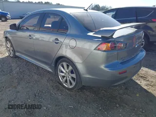 2015 Mitsubishi Lancer GT with VIN JA32U8FWXFU025656, listed as a IAAI auction lot 41482098 with 295,626 mi miles. Bid and sale history available at carsss.com. Image 3.