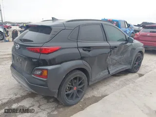 2021 Hyundai Kona NIGHT with VIN KM8K63A5XMU691471, listed as a IAAI auction lot 41589254 with 56,083 mi miles. Bid and sale history available at carsss.com. Image 4.
