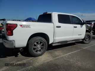 2013 Toyota Tundra 4WD Truck with VIN 5TFDW5F12DX315795, listed as a Copart auction lot 52210045 with 144,106 mi miles and Salvage Title. Bid and sale history available at carsss.com. Image 3.