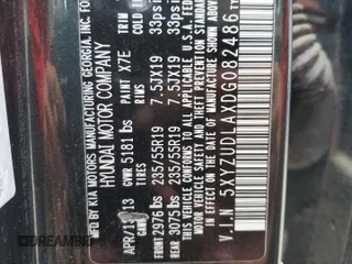 2013 Hyundai Santa Fe Sport z VIN 5XYZUDLAXDG082486, wystawiony jako Copart lot #68941974 z przebiegiem Nie podano mil oraz Szkoda całkowita • Salvage title. Historia ofert i sprzedaży dostępna na DreamBid. Obrazek 13.