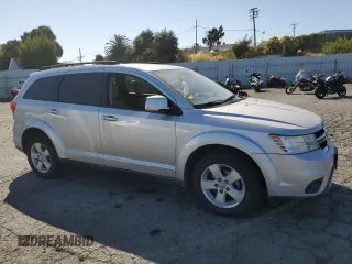 2012 Dodge Journey SXT z VIN 3C4PDDBG0CT293331, wystawiony jako Copart lot #62602995 z przebiegiem 185 605 mil mil oraz Szkoda całkowita • Salvage title. Historia ofert i sprzedaży dostępna na DreamBid. Obrazek 4.