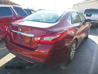 2016 Nissan Altima SR with VIN 1N4AL3AP0GC287167, listed as a IAAI auction lot 41857320 with 135,618 mi miles and . Bid and sale history available at carsss.com. Image 4.
