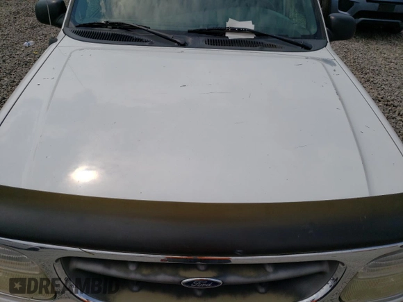 1999 Ford Explorer XLT with VIN 1FMZU32P6XZB94980, listed as a Copart auction lot 66349164 with 290,386 mi miles and Clean title. Bid and sale history available at DreamBid. Image 11.